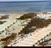 Sittin on the Beach - New Castle Holiday