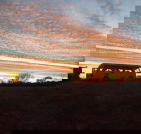 Bus Transfer Alice Springs to Ayers Rock Resort - New Castle Holiday