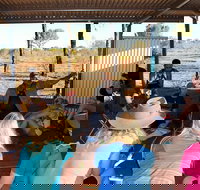 Aboriginal Homelands Experience from Ayers Rock including Sunset - New Castle Holiday