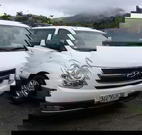 IMAX Private Transfer 7 Guests Cairns Airport to Palm Cove - New Castle Holiday