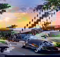 Maserati Quattroporte Limousine Transfer Cairns Airport to City - New Castle Holiday