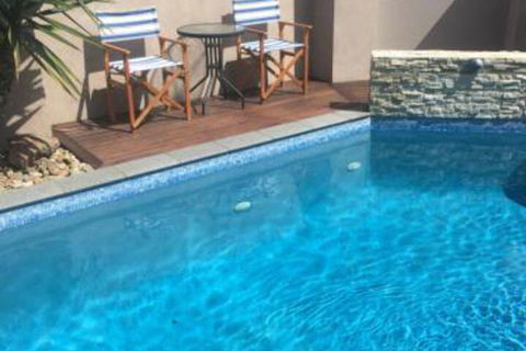 Beach Haven Poolside - New Castle Holiday 4