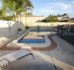 62 Tingira Close Modern lowset home with swimming pool outdoor area ample parking. Pet friendly - New Castle Holiday