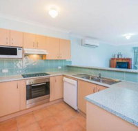 Beachside 22 LJHooker Yamba - New Castle Holiday