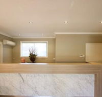 Potters Apartments - New Castle Holiday