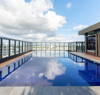 Japanese Style waterfront apt wt rooftop pool - New Castle Holiday