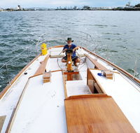 Cruising Yacht in Marina - New Castle Holiday