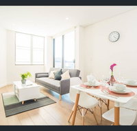 Gorgeous modern brand new two bedroom apartment with large lounge and private garden view balcony - New Castle Holiday