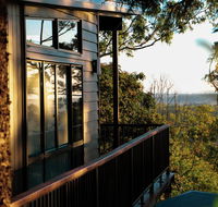 Rainforest Gardens - Luxury Hillside Chalets with Views to Bay  Islands - New Castle Holiday