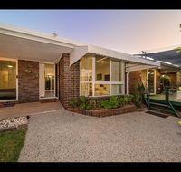 Woorim Secluded Palms Cottage - New Castle Holiday