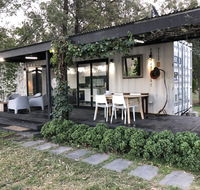 Absolute riverfront shipping container cabin - New Castle Holiday