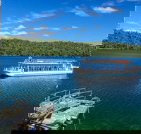 The Original Day Tour to Paronella Park Lake Barrine and Millaa Millaa Falls - New Castle Holiday